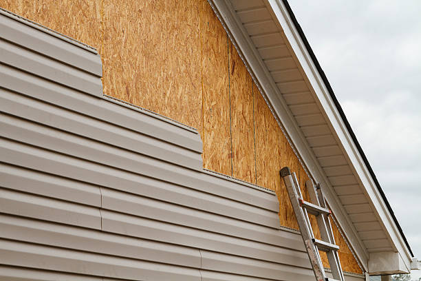 Professional Emergency Siding Repair technician working in Rogers, OH